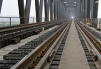 Bridge railroad tie application